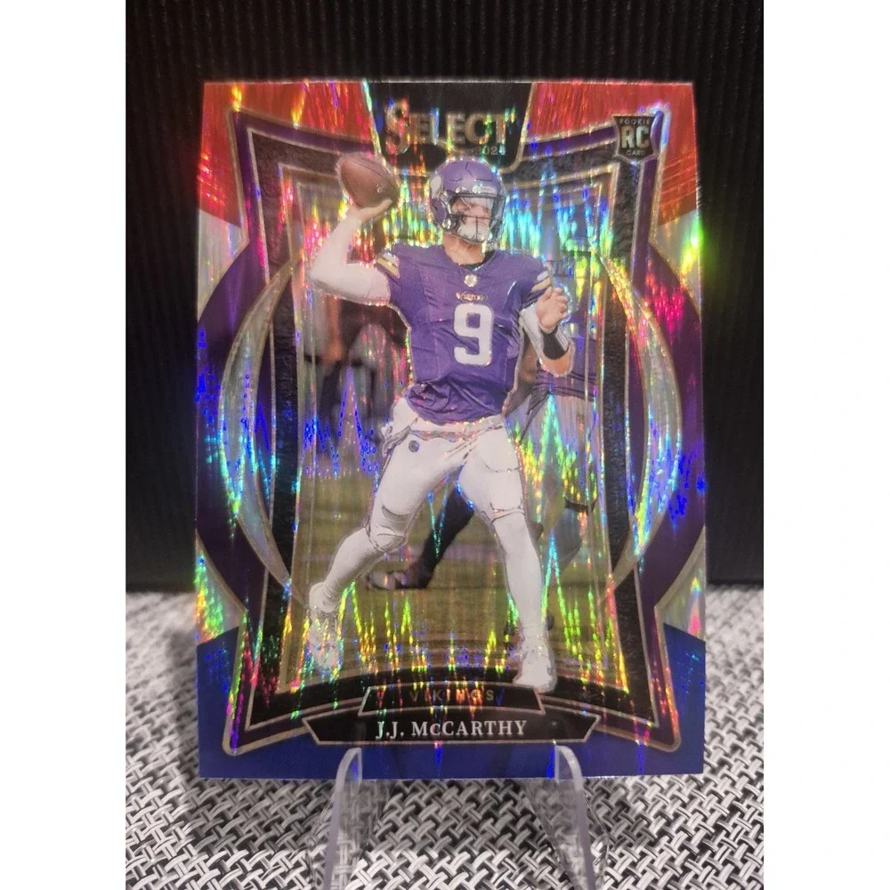 2024 Panini Select Concourse‎ J.J. McCarthy #24 Red & Blue Shock Prizm (RC)